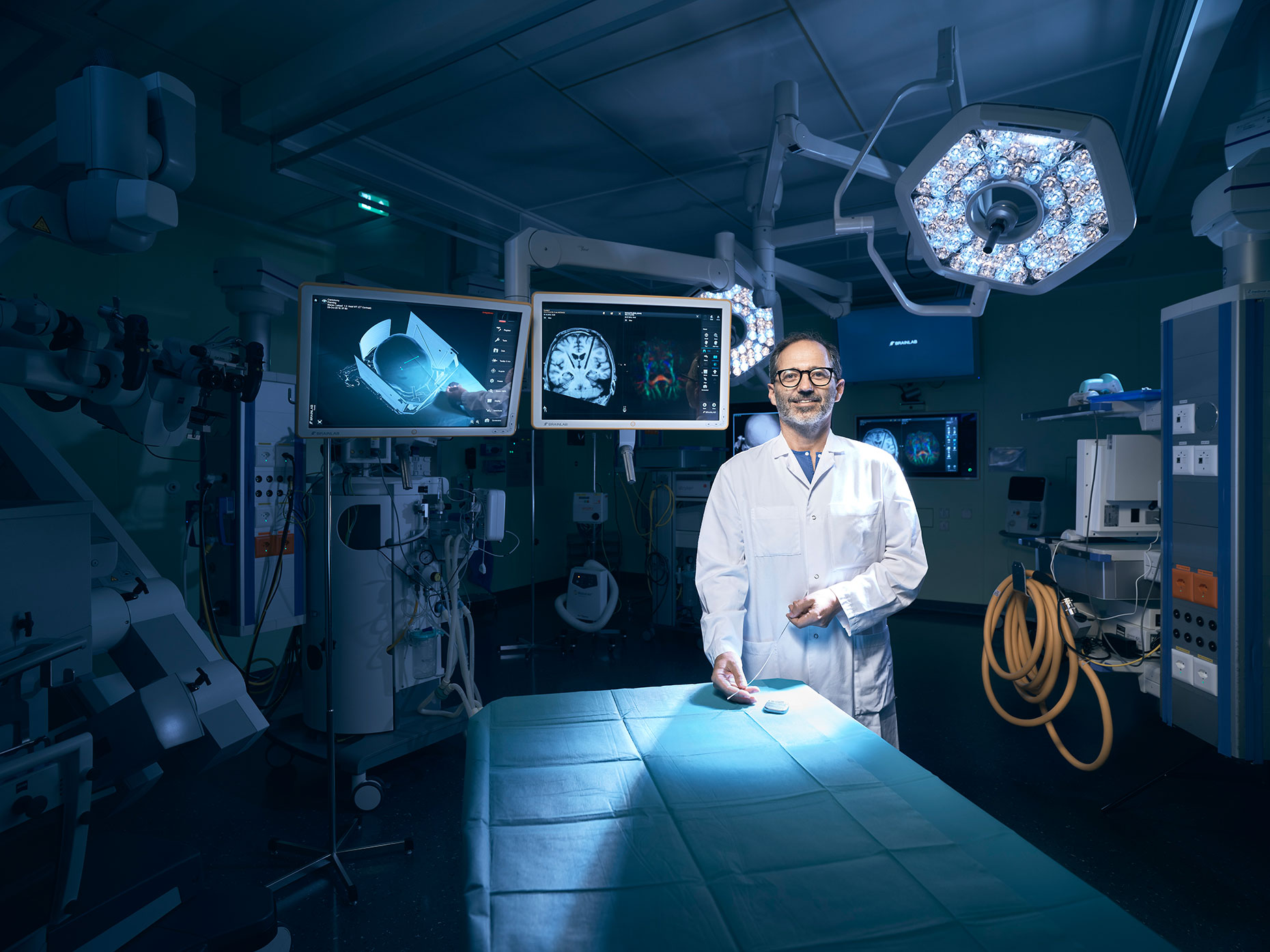 Claudio Pollo, Deputy Head Physician, Head of Functional Neurosurgery in an operating room at Inselspital Bern for Bilanz